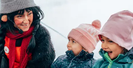 Trolle and Trolla for a high five on the slope